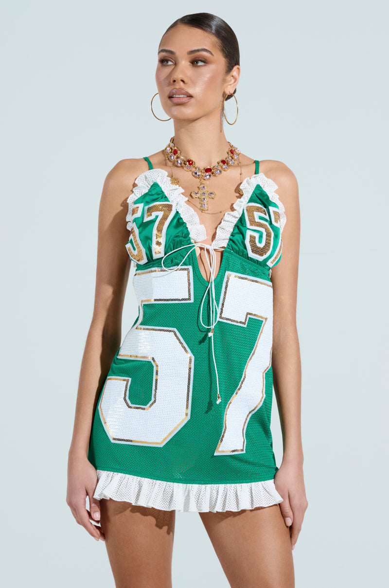 TOUCHDOWN SEQUIN JERSEY DRESS IN GREEN AKIRA TOUCHDOWN SEQUIN JERSEY DRESS IN GREEN AKIRA