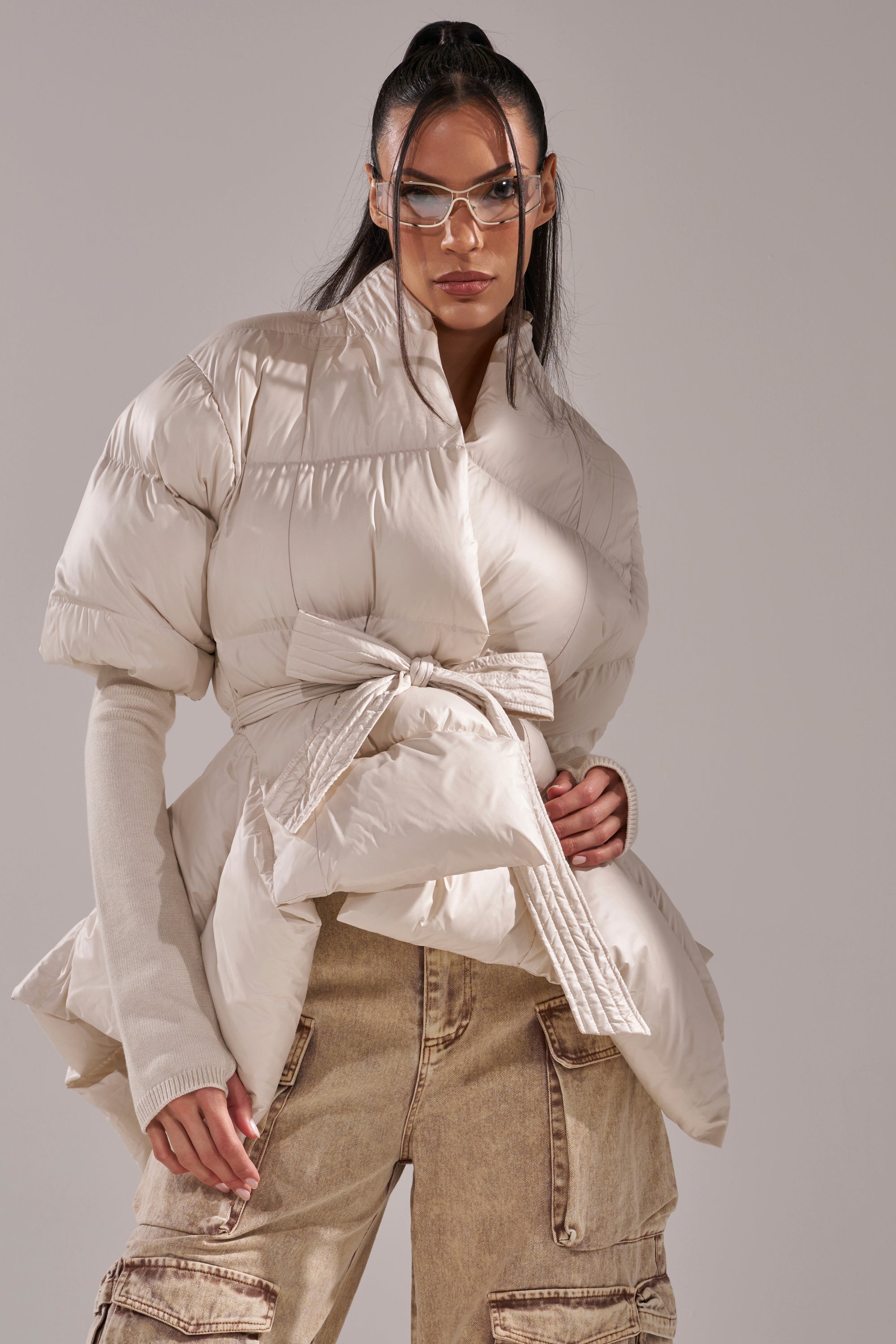 RIB SLEEVE PEPLUM PUFFER IN IVORY – AKIRA