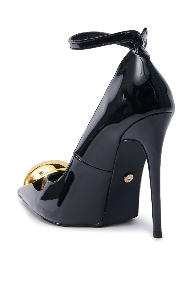 AZALEA WANG ESMARIA BLACK STILETTO PUMP in black patent faux leather, featuring an ankle strap and metallic gold accent on the front. The side view highlights the stiletto design with a shiny finish and a comfort cushion insole for enhanced comfort.