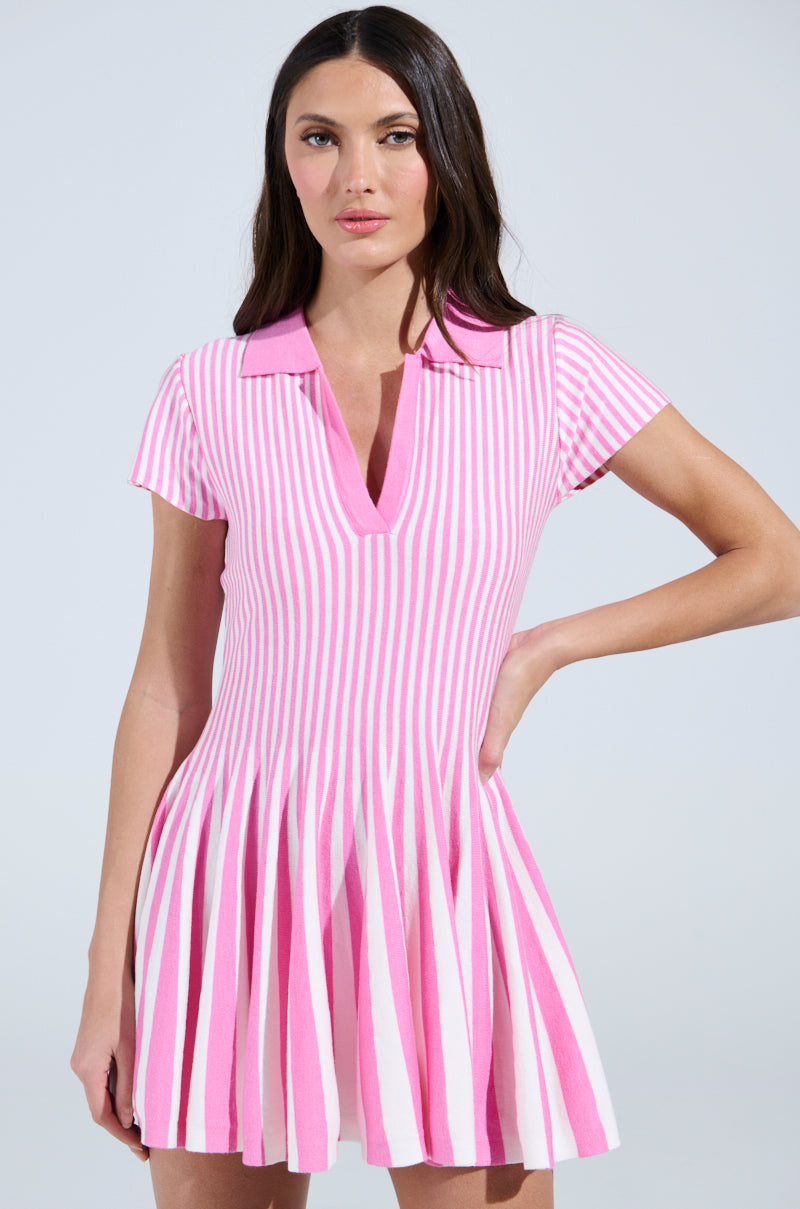 ALINA PLEATED KNIT FIT AND FLARE MINI DRESS IN PINK MULTI AKIRA ALINA PLEATED KNIT FIT AND FLARE MINI DRESS IN PINK MULTI AKIRA