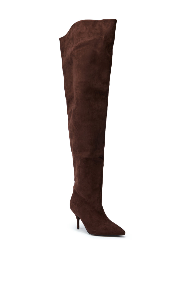 The AZALEA WANG HALINA brown faux suede stiletto boot, featuring a pointed toe and a slender high heel, stands upright against a plain white background.
