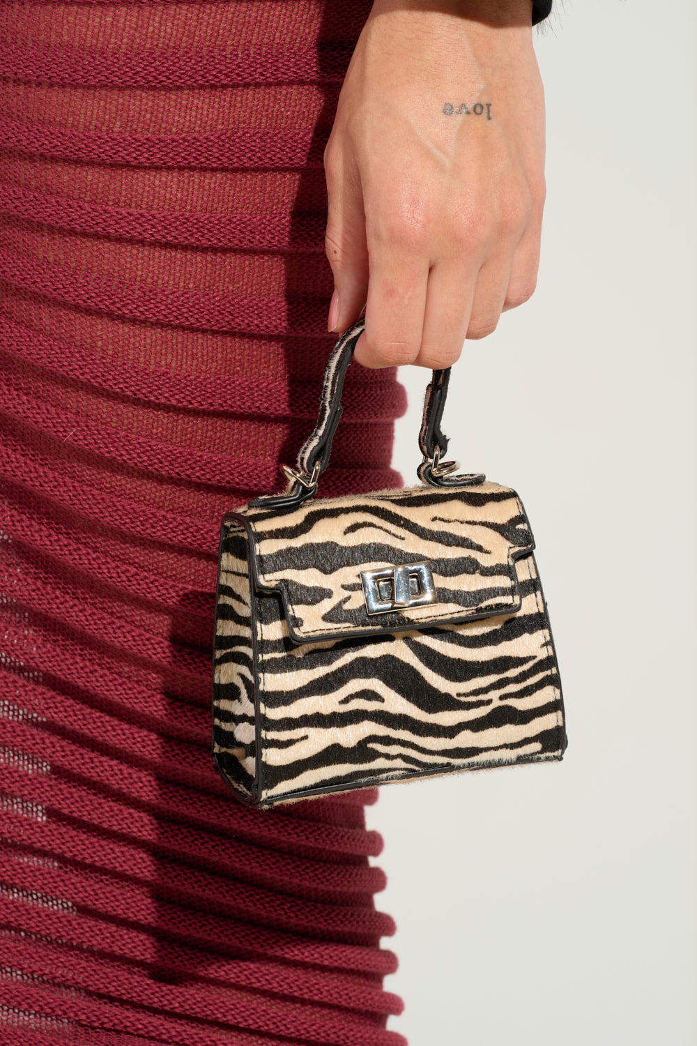 WILD ONE ZEBRA MINI PURSE – AKIRA