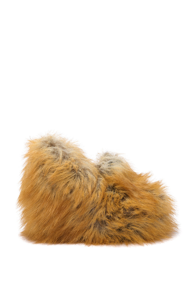 The AZALEA WANG JAEKE FOX FUR WEDGE PUMP IN BROWN, a single slipper-like wedge pump covered in orange-brown faux fur with gray hints, is displayed against a white background.