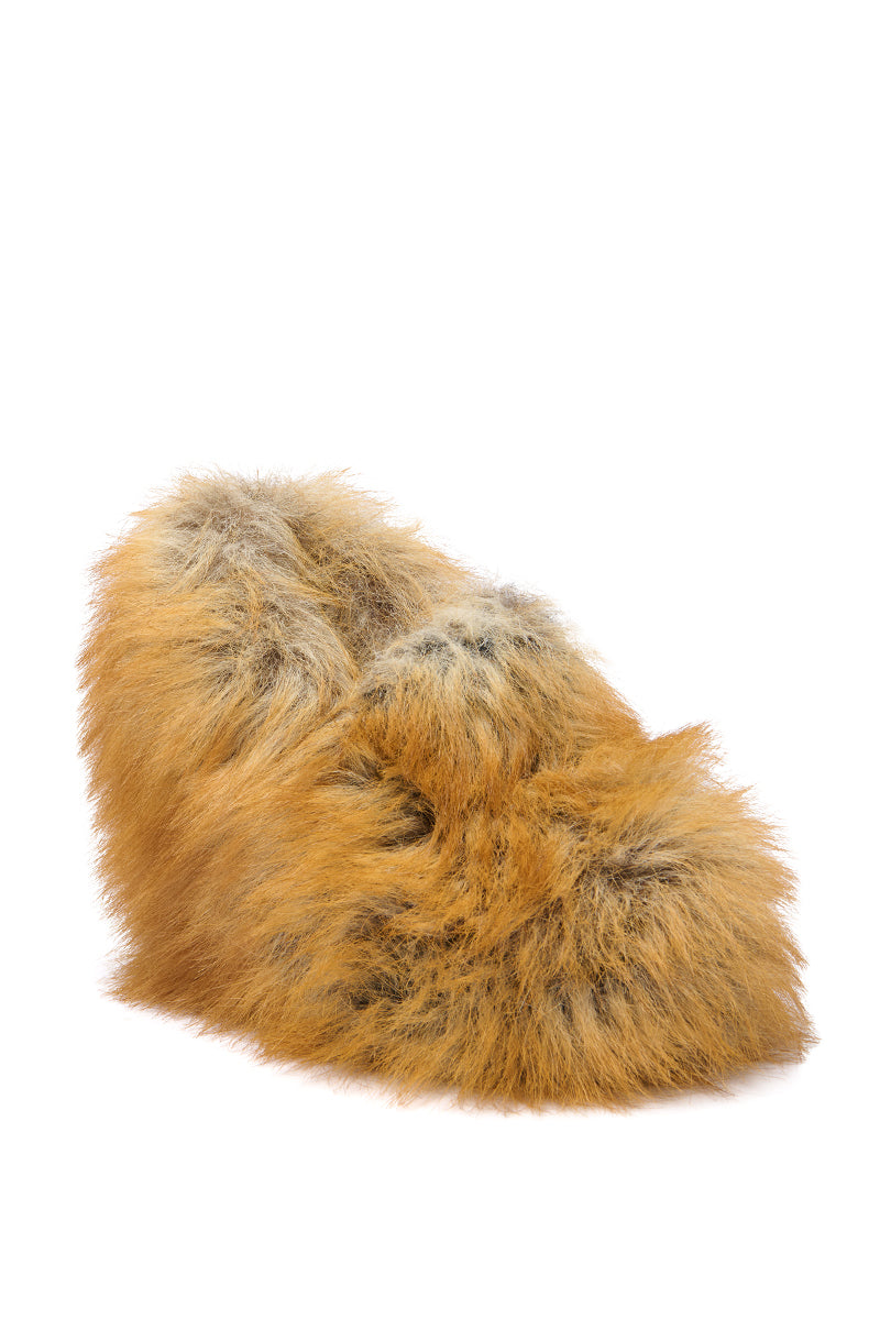 The AZALEA WANG JAEKE FOX FUR WEDGE PUMP IN BROWN is a bold statement shoe, fully covered in long, fluffy, golden-brown faux fur with hints of gray and finished with a striking wedge heel.