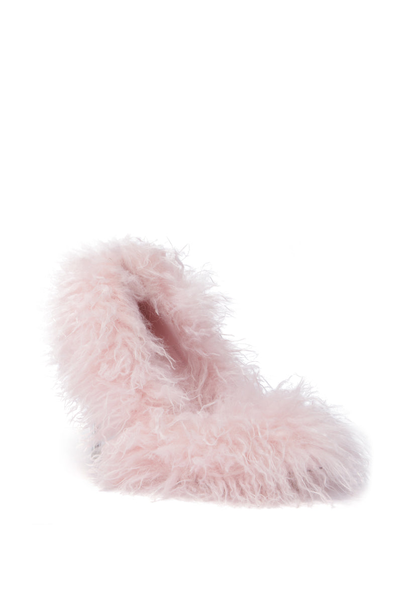 A cozy, fluffy pink AZALEA WANG JAMEELA stiletto pump made of soft, plush faux fur, showcased against a plain white background.