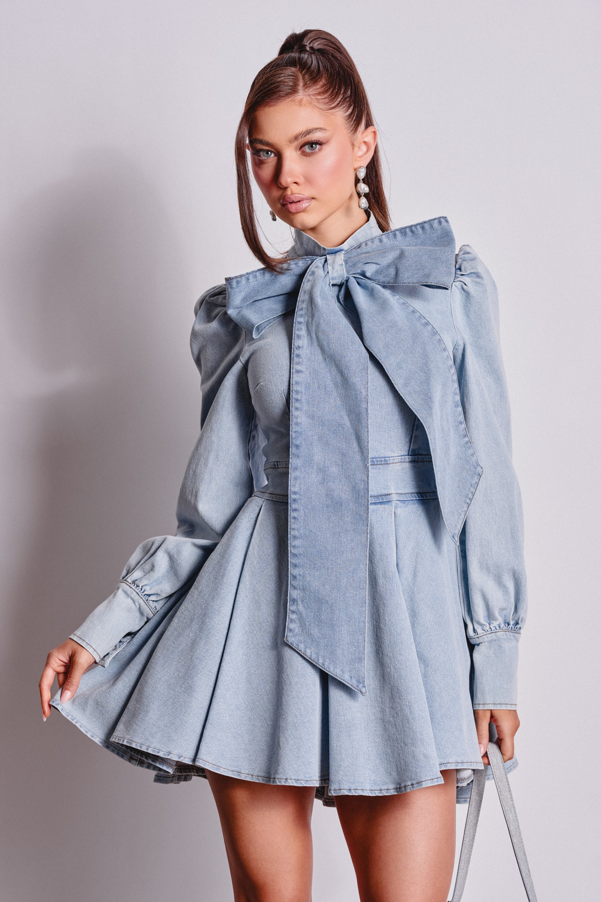 CAROLINA DENIM BOW MINI DRESS AKIRA CAROLINA DENIM BOW MINI DRESS AKIRA