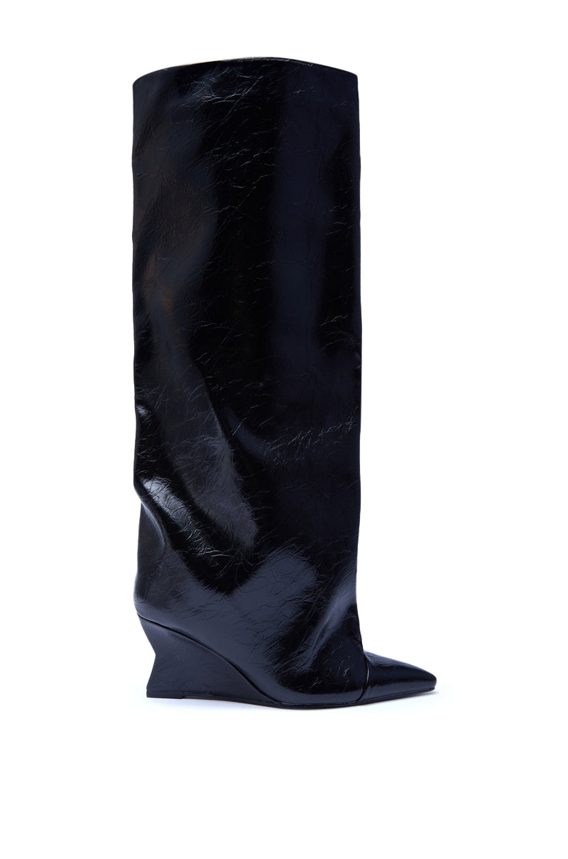 The AZALEA WANG KENYA BLACK KNEE HIGH WEDGE BOOT is a tall, black shiny leather boot with a pointed toe and low wedge heel, shown in a side view against a white background.