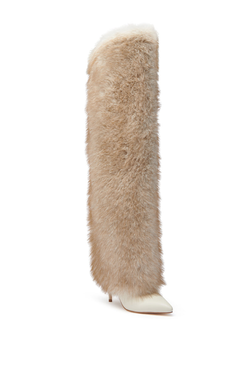The AZALEA WANG LAGANN BONE THIGH HIGH FUR LUXE BOOT is a tall white boot with a pointed toe and stiletto heel, wrapped in thick light beige faux fur that leaves just the toe and heel exposed.