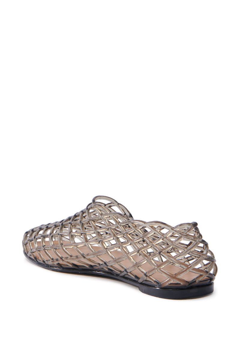 The AKIRA LINUS BLACK FLAT shoe showcases a black lattice design with an almond toe and flat sole. The rear view emphasizes its intricate crisscross pattern and open structure, offering a stylish and breathable look.