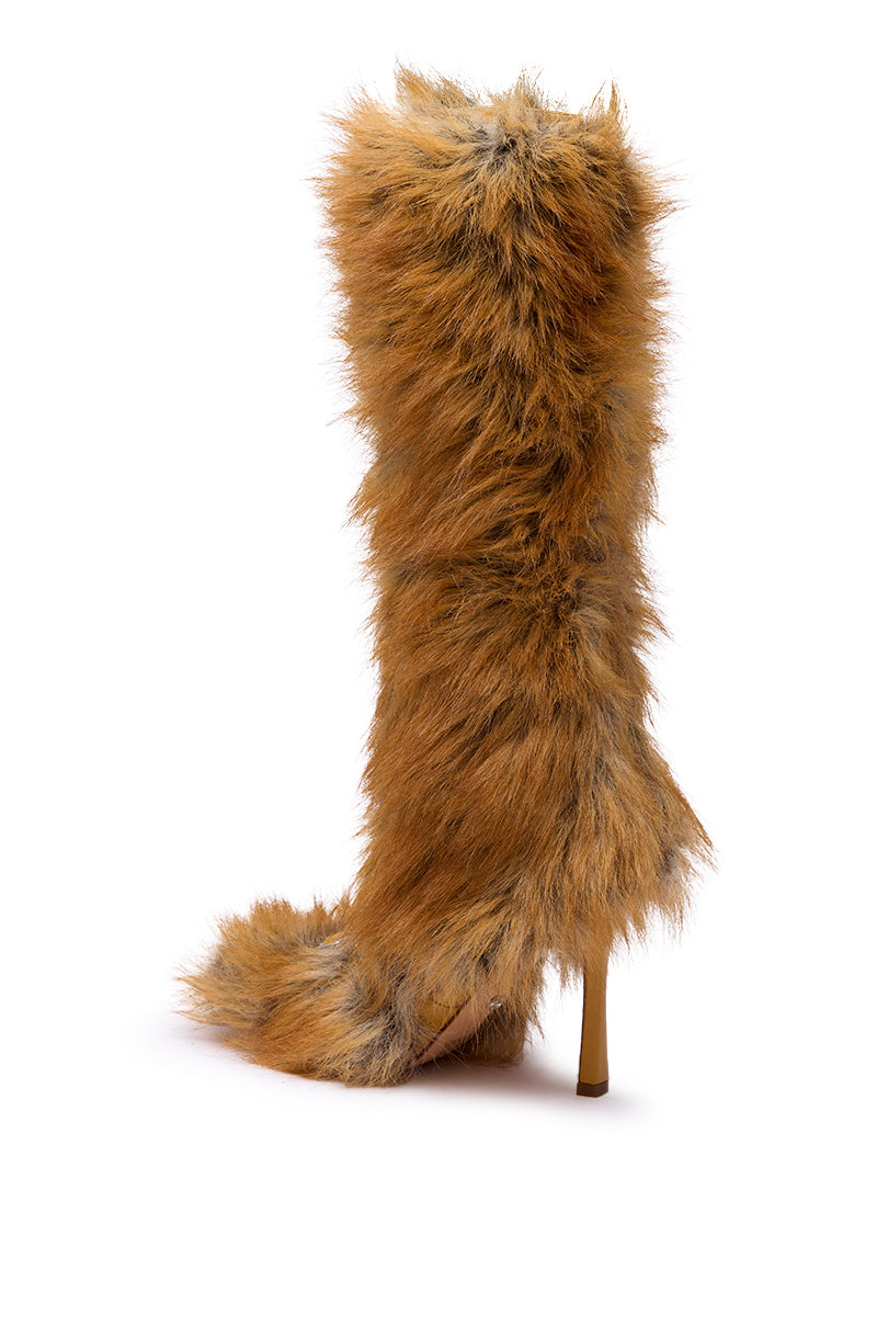 The AZALEA WANG LOURDANNE TAN FUR LACE UP STILETTO BOOT is a knee-high stiletto covered in shaggy orange-brown faux fur with grayish highlights, shown against a plain white background.