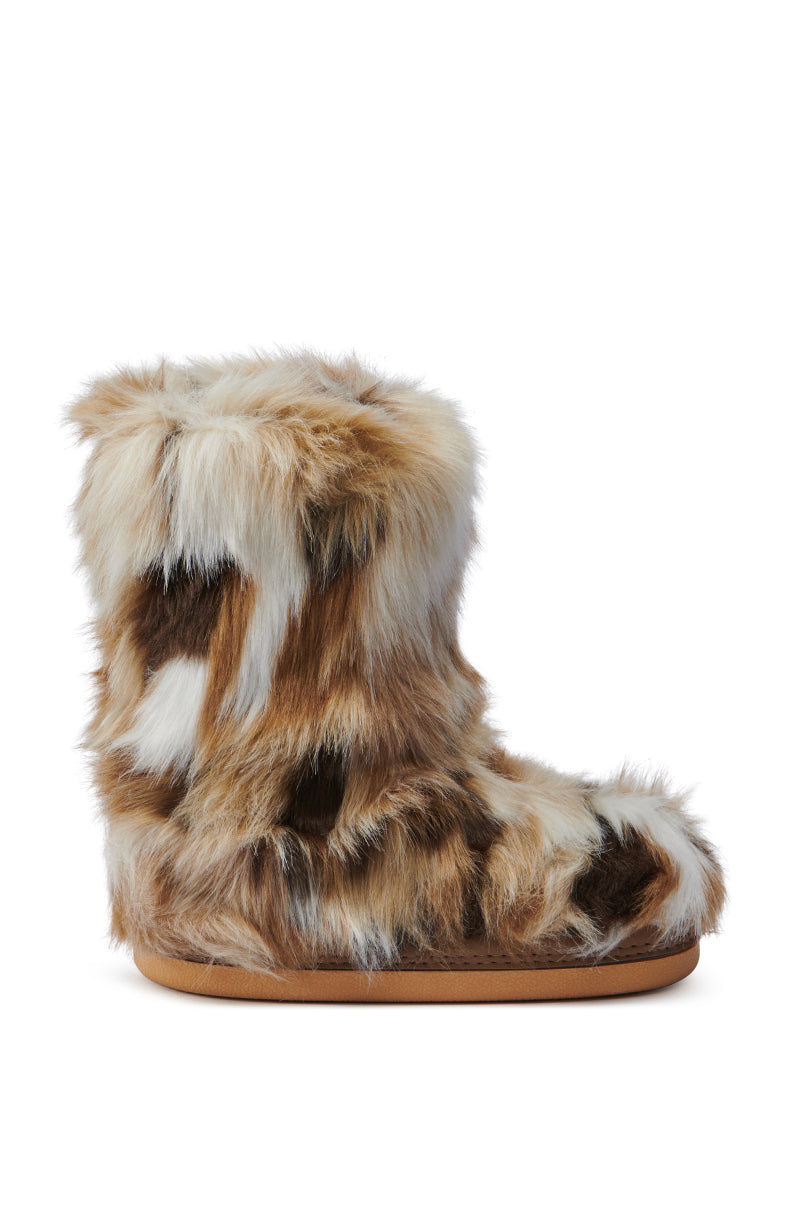 Introducing the AZALEA WANG NADIANA BROWN FUR FLAT BOOTIE: a cozy flat bootie featuring a cushioned sole. This fashionable footwear showcases faux fur in light and dark brown tones, accented with white patches for extra fluffiness. Set against a pristine white background, it perfectly highlights the stylish yet comforting appeal of this must-have bootie.