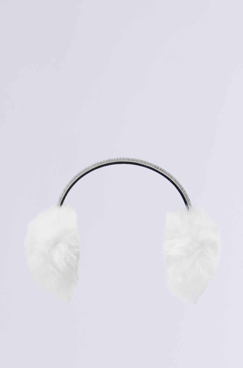 EXTRA RHINESTONE EAR MUFFS IN WHITE are designed with white faux fur and a black band, embellished with small shining stones along the top. These earmuffs provide soft, plush padding and are set against a plain white background, blending elegance and comfort for chilly weather.
