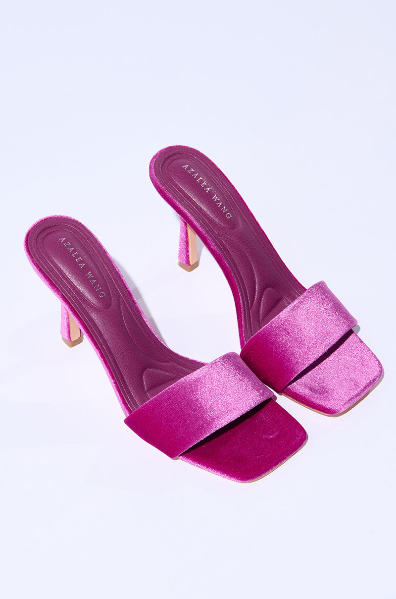 AZALEA WANG PERSUASION FUCHSIA SANDAL features a vibrant fuchsia color with a satin finish. These stiletto heels have open square toes, padded soles, and the brand name "AZALEA WANG" on the insoles. The slender heels are elegantly wrapped in matching pink fabric.