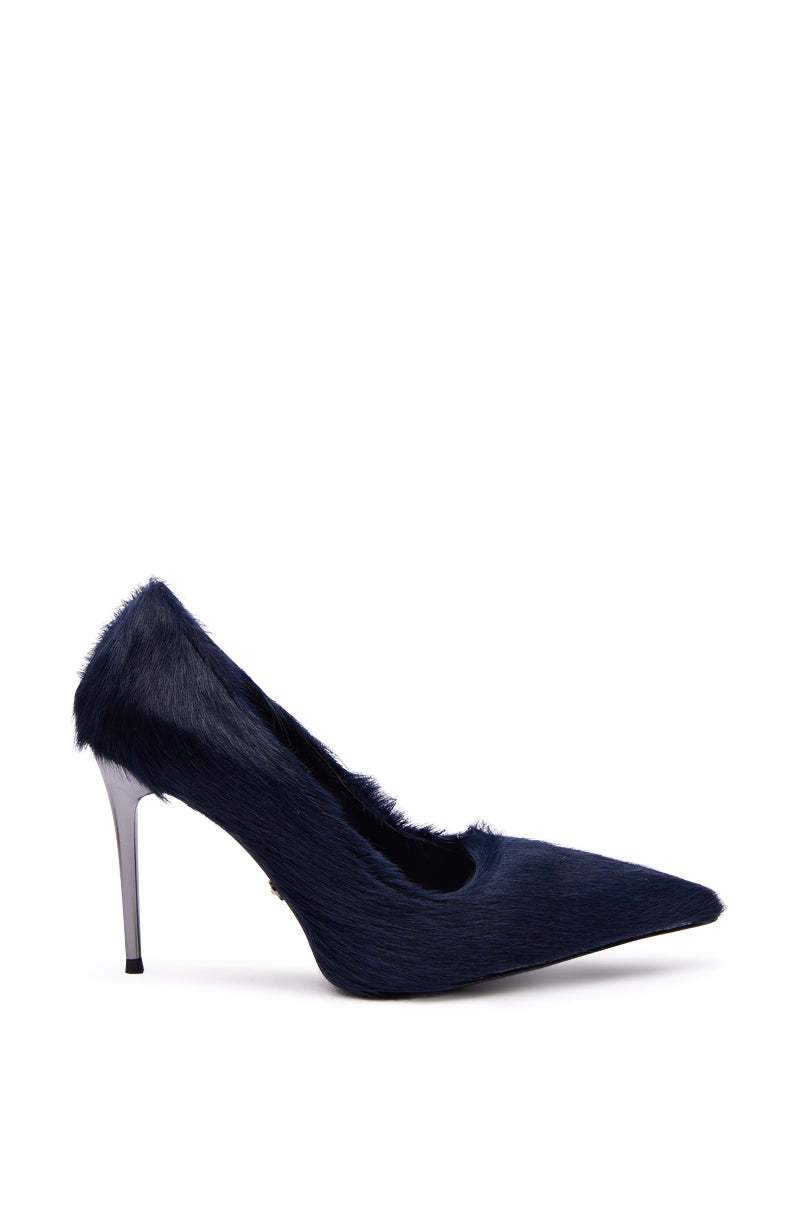 The AZALEA WANG ROSEE NAVY PONY HAIR PUMP features a navy faux fur upper with a pointed toe and a sleek metallic stiletto heel, creating a bold contrast. This stylish pump is showcased on a white background.