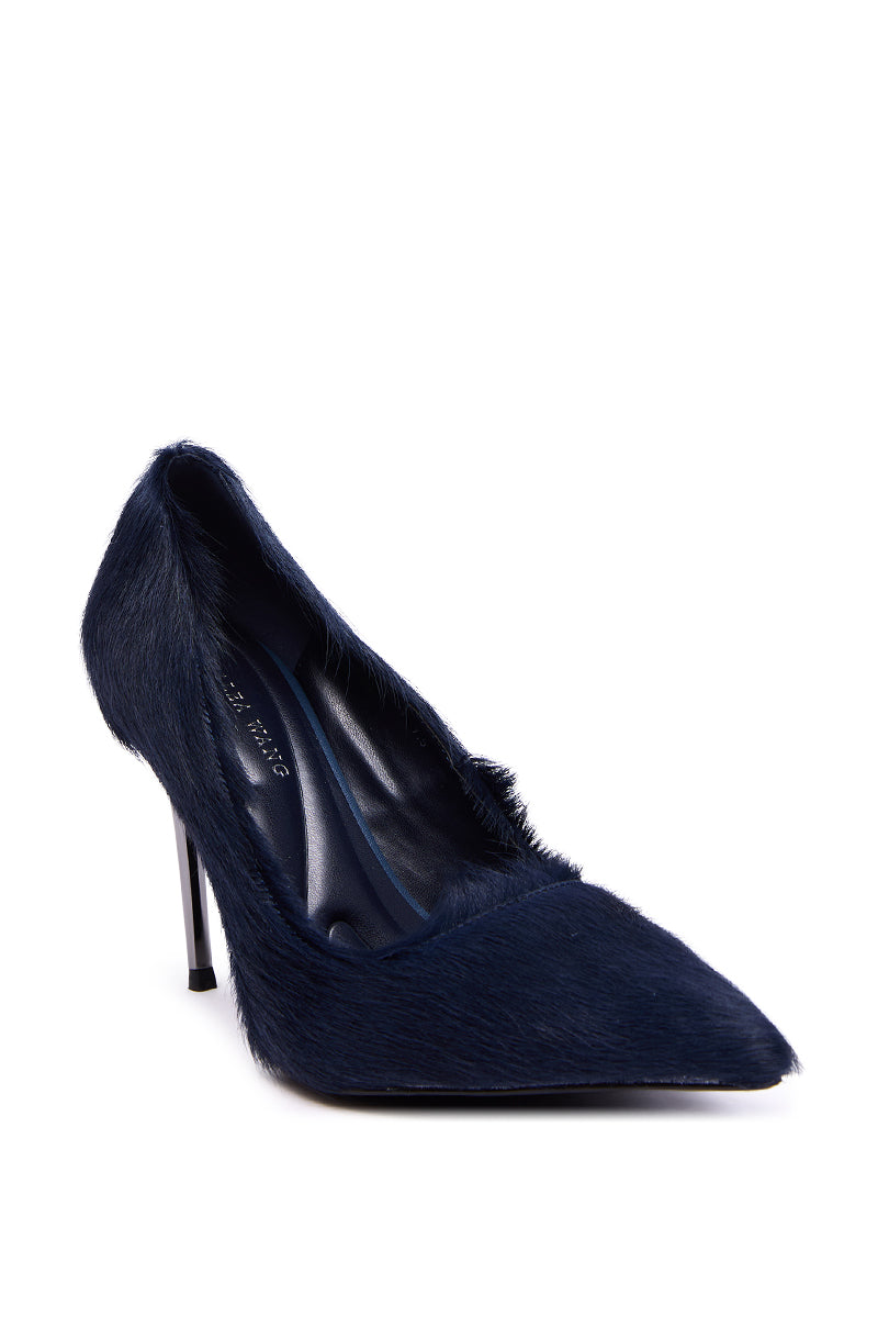 The AZALEA WANG ROSEE NAVY PONY HAIR PUMP features a pointed toe, slim stiletto heel, and soft navy pony hair texture, shown against a white background.