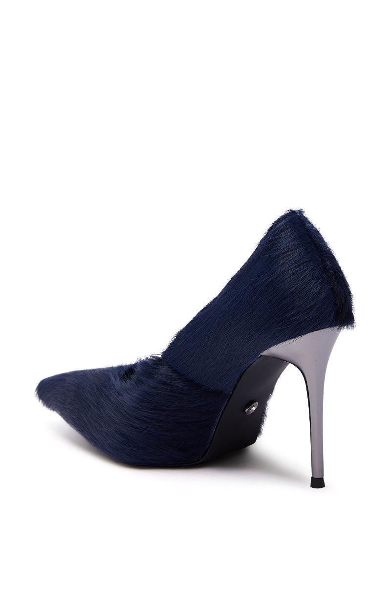 The AZALEA WANG ROSEE NAVY PONY HAIR PUMP features a pointed toe, navy blue faux fur upper, and a sleek metallic silver stiletto heel.