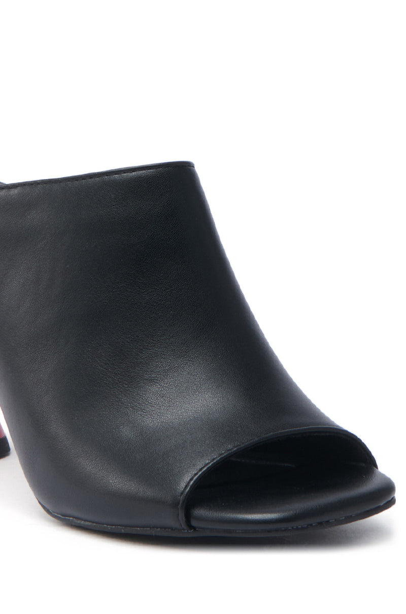 The AZALEA WANG SIDLE Black Slip-On Mule Sandal features a polished black faux leather peep-toe design, accented by a vibrant red heel that enhances its minimalist style. Photographed on a plain white background, it showcases the front opening and part of the sole.