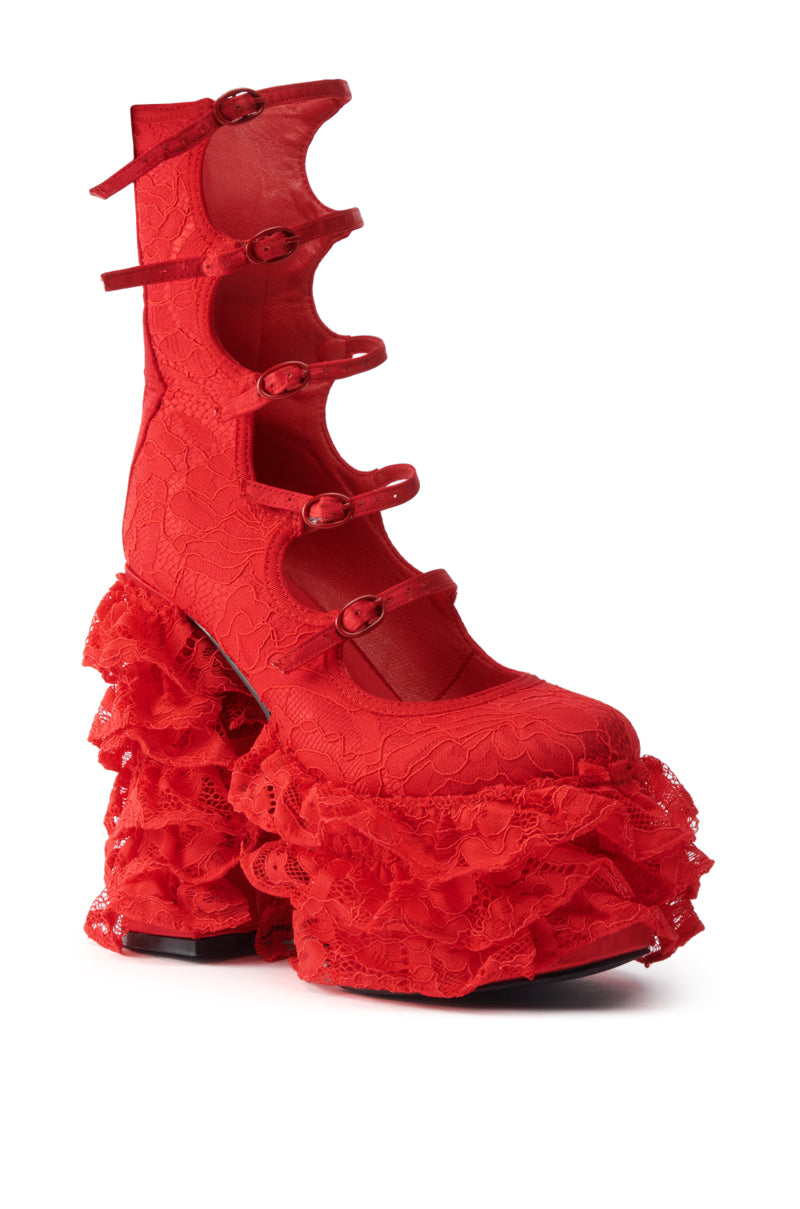 The AZALEA WANG SPREENE RED CHUNKY PUMP features an almond toe, five buckle straps, a lace platform sole, and multiple layers of ruffled lace on the heel and sole.