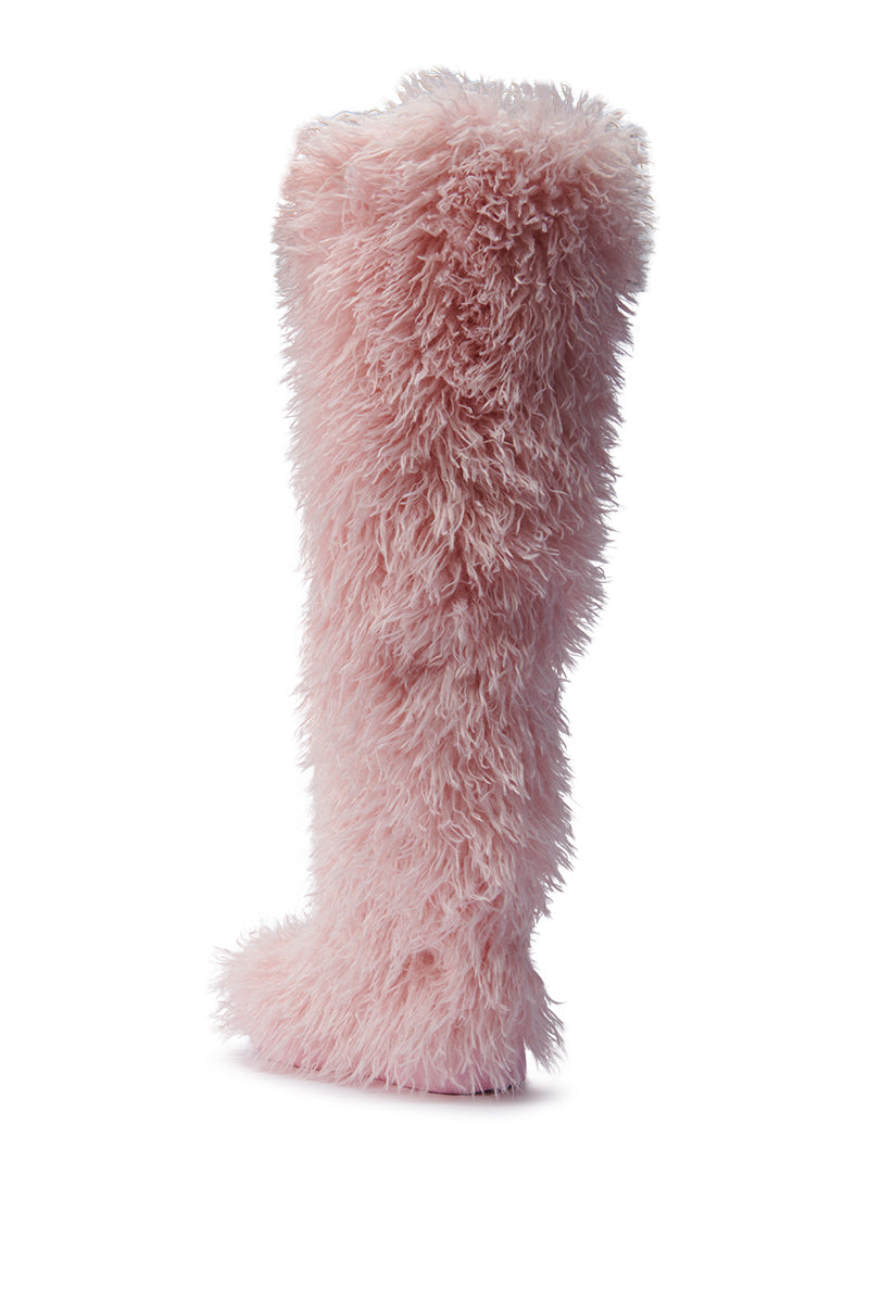 A single AZALEA WANG TEMPLETON pink poodle faux fur over-the-knee boot with a shaggy texture, beautifully displayed against a white background.