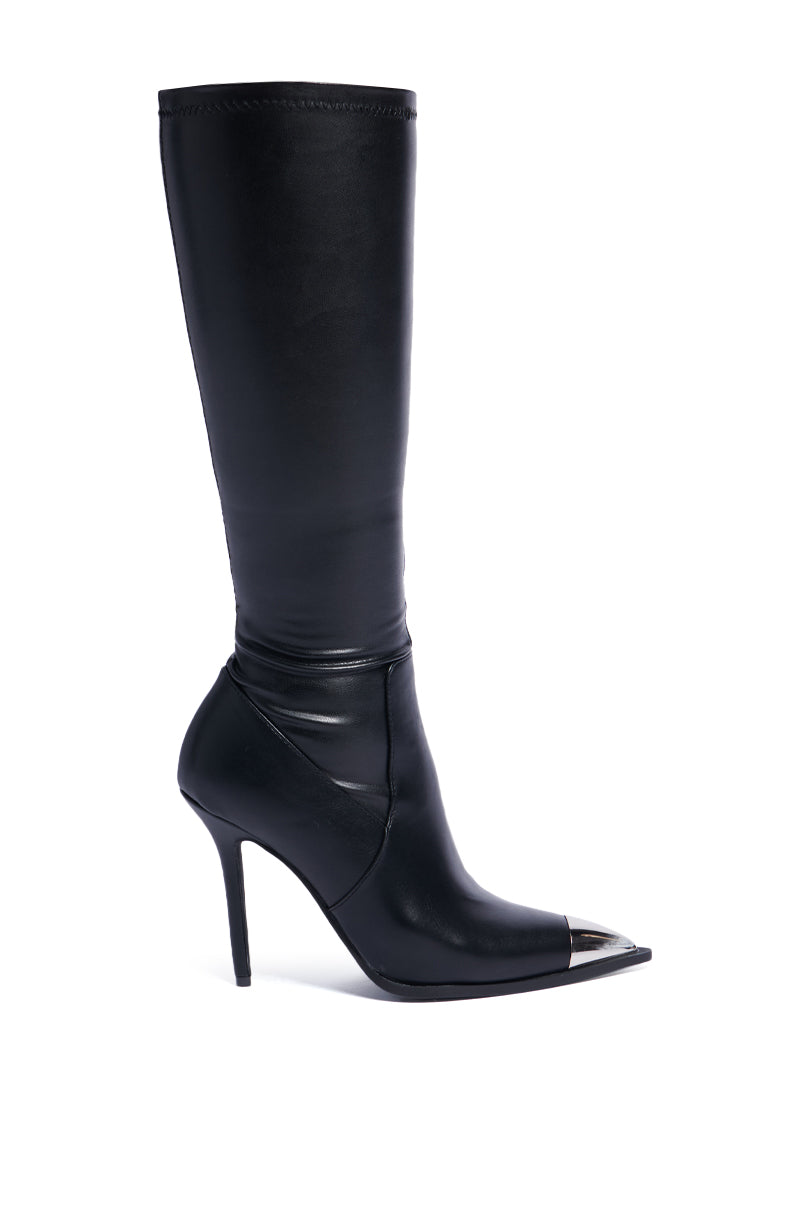 Presenting the AZALEA WANG XIAO Black Knee High Boot, this stunning footwear showcases a sharp metal toe cap and an elegant stiletto heel, beautifully captured from the side against a plain white background.