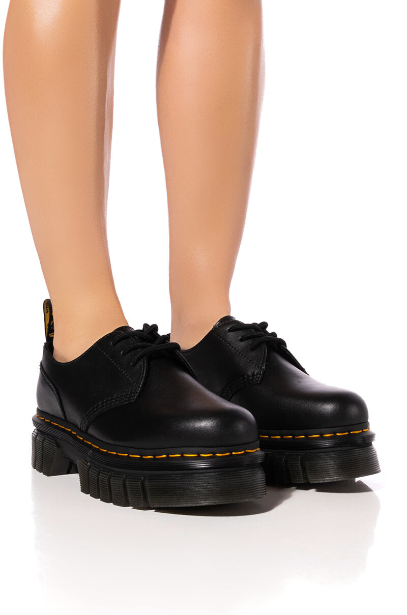 Dr. Martens - Audrick - Stivali stringati a 8 occhielli neri con suola spessa Dr. Martens - Audrick - Stivali stringati a 8 occhielli neri con suola spessa