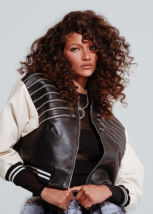 Black and white faux leather bomber jacket with zipper design