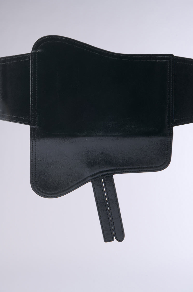 The DIDI LOVES ME PU POUCH BELT is a wide black faux leather belt with a bold, asymmetrical flap and two hanging straps—stylish and storage-friendly, it adds flair to any outfit against a plain light background.