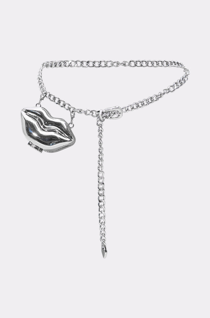The LIPPY SILVER BELT features a sleek silver chain with a metallic lip-shaped charm and an adjustable dangling chain, shown against a plain white background.