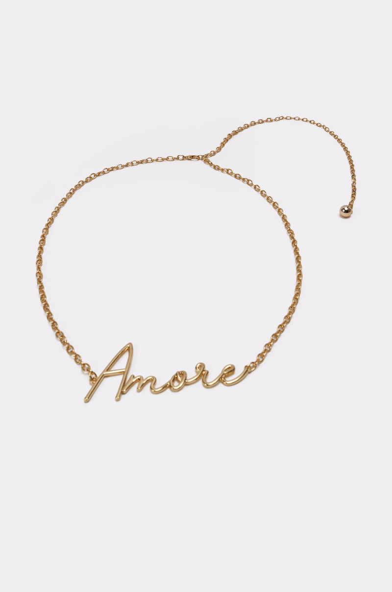 The AMORE CHAIN BELT features "Amore" in elegant cursive script, reminiscent of a gold chain necklace, and is displayed on a plain white background. 4