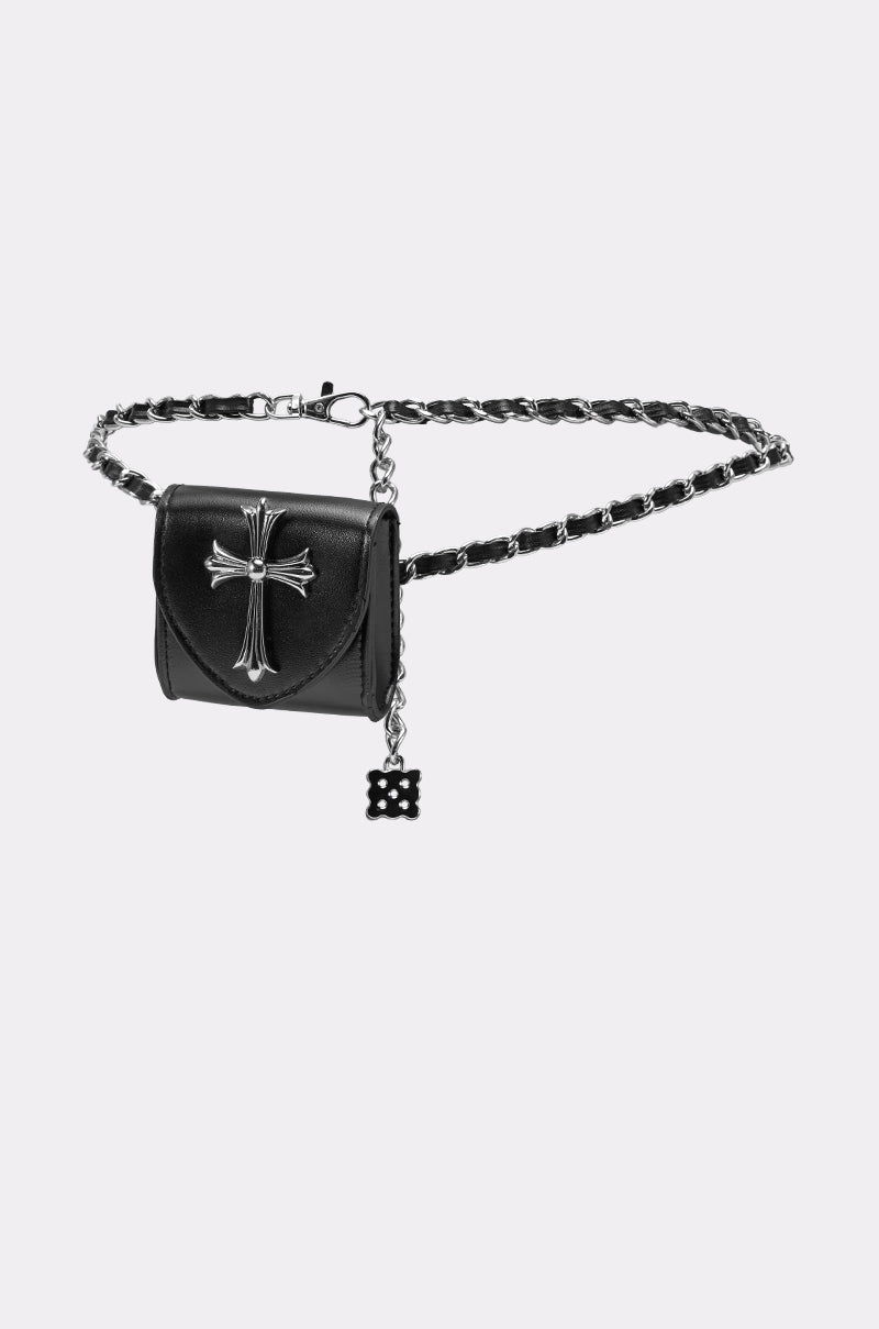 The CALL ME CHROME BELT BAG is a black faux leather belt bag with a silver chain, small matching pouch showcasing a raised silver cross, and a dangling square charm with cut-out details for added style. 3