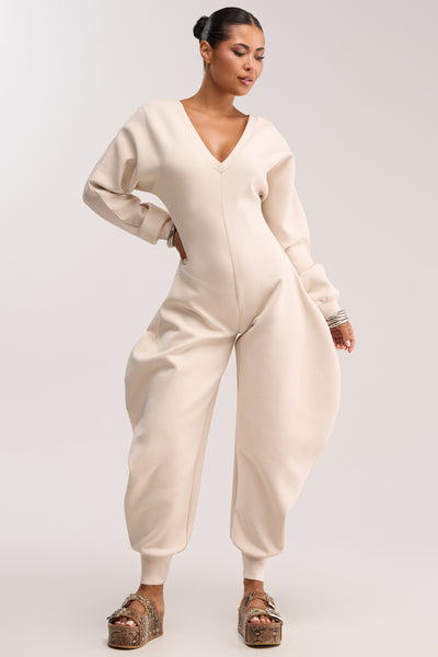 ワンピース HYKE BALLOON SLEEVE JUMPSUIT Cotton Knit Barrel Leg Jumpsuit in Ivory | AKIRA