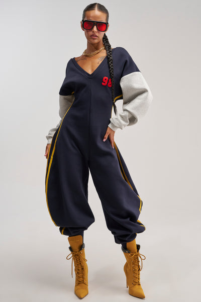 COMFY COZY VARSITY JUMPSUIT IN NAVY – AKIRA
