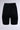 The TITSY TUMMY TUCK SHORTS IN BLACK are high-waisted shapewear shorts with seamless hems, designed to provide support and a slimming effect, set against a plain light gray background.