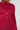 A person is dazzling in the IF LOOKS COULD KILL RHINESTONE MINI DRESS IN RED from AKIRA Label. The sparkling red dress boasts a curve-hugging silhouette and long sleeves, crafted from a stretchy mesh knit. Their braided hair perfectly complements the glamorous outfit against the plain white background.