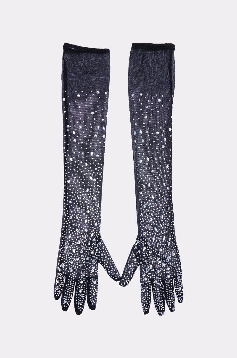 The BLAIR BLING GLOVES are long, black mesh gloves featuring a sparkling gradient of rhinestones for a bold bling look, shown flat on a light gray background.