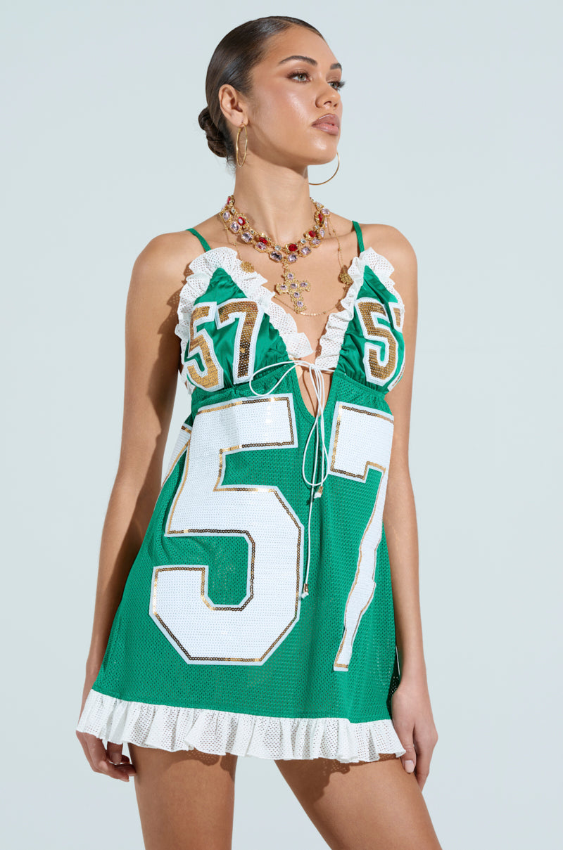 TOUCHDOWN SEQUIN JERSEY DRESS IN GREEN AKIRA TOUCHDOWN SEQUIN JERSEY DRESS IN GREEN AKIRA