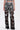 A person models the FLORAL SEQUIN MESH PANT—high-rise, wide-leg pants with a sheer mesh base and white floral embroidery—against a plain light background. The image is cropped from the shoulders down.