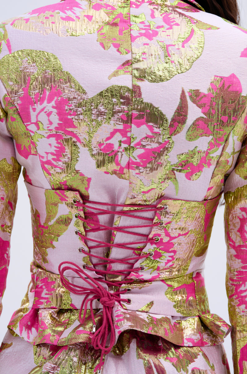 Close-up of the LOVELY FLORAL BROCADE BLOUSE featuring beautiful pink, green, and gold brocade, a satin-lined interior, and pink lace-up detail at the waist for a fitted, decorative look.