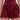 A person wearing the RED HOT FLOUNCY SHORT in a rich burgundy satin with a matching top; the image is cropped from midriff to thighs.