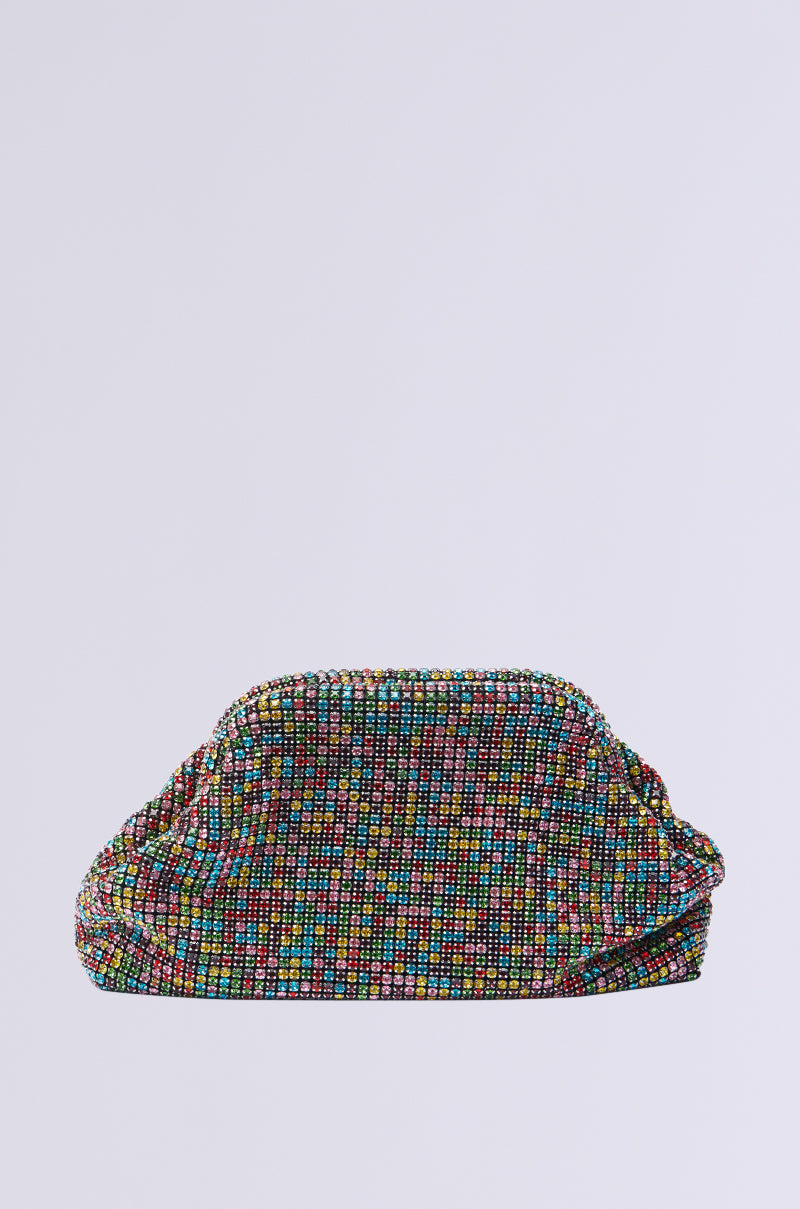 The MAKE EM CHASE BLING CLUTCH shines with colorful rhinestones on a plain white background. Its textured look, softly gathered top, and rectangular shape make it an eye-catching accessory for any outfit.