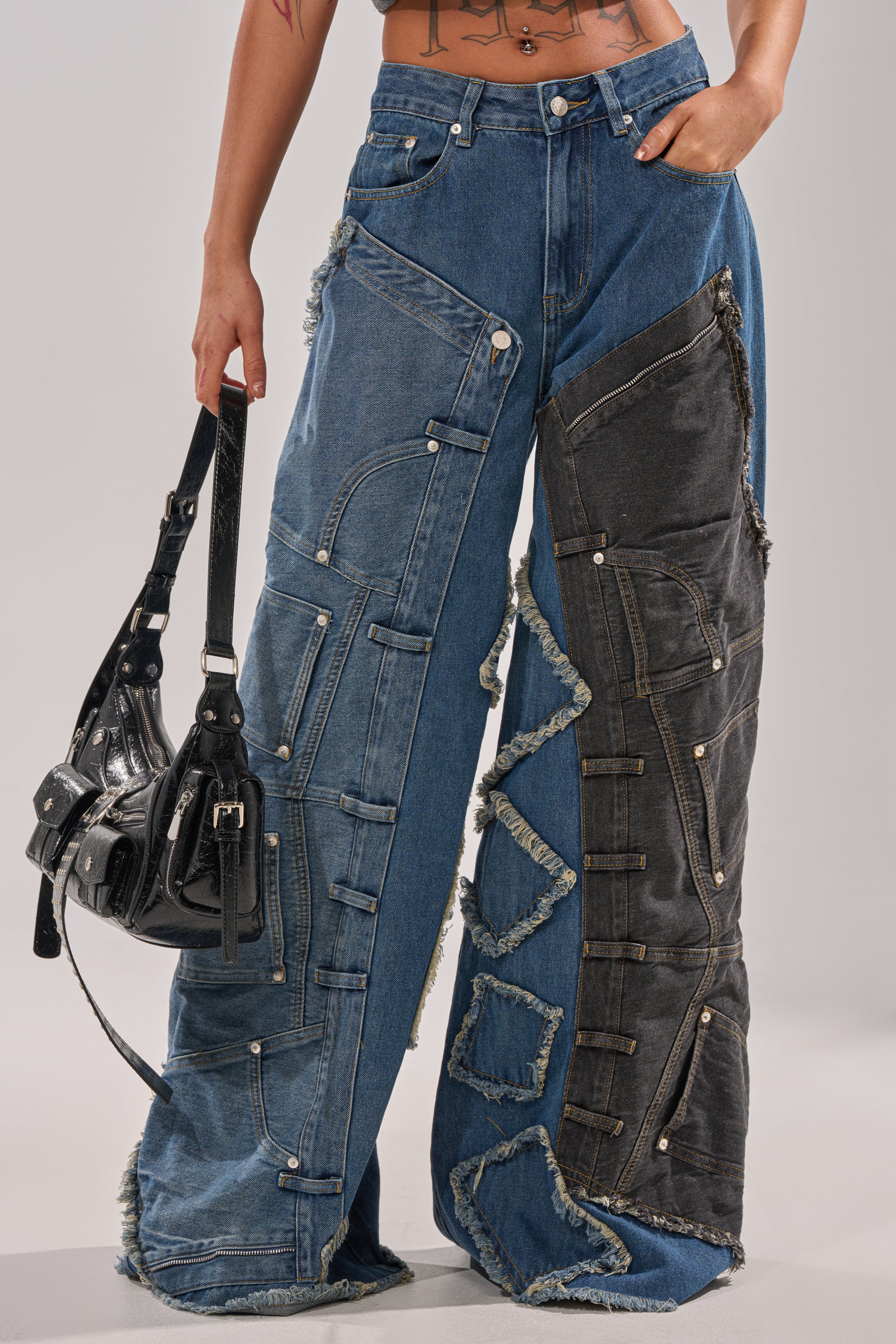 Someone wearing MIXED MATCH RELAXED DENIM, wide-leg jeans styled with a streetwear vibe. 1