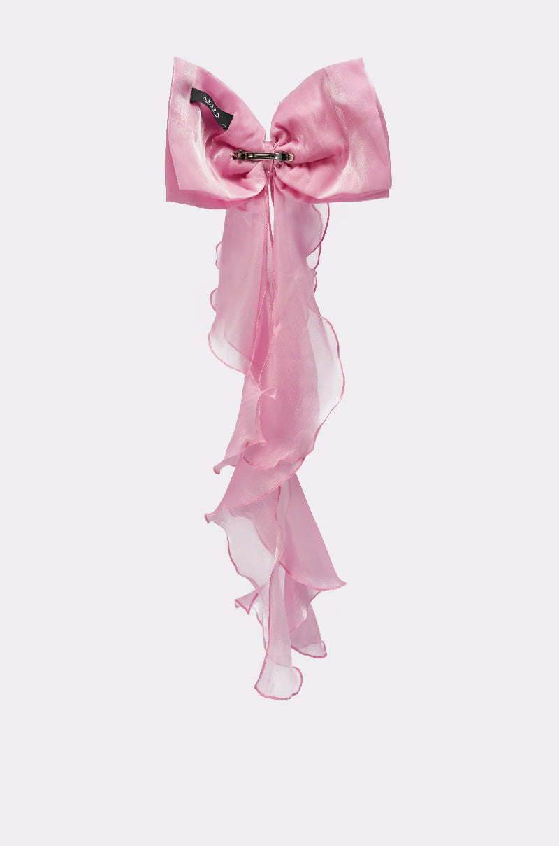 The MY LOVE CHIFFON HAIR BOW is a large, sheer pink clip with flowing ruffled tails and a safety pin center, making a bold statement accessory displayed on a plain light background. 3