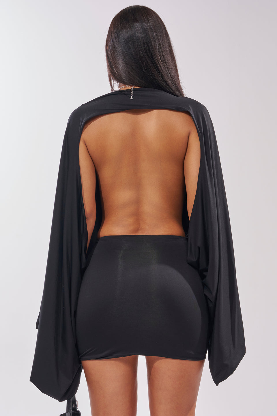 draped open-back a-line mini dress in black reviews SLEEVELESS LOW BACK DRAPE MINI DRESS Black Norma Kamali