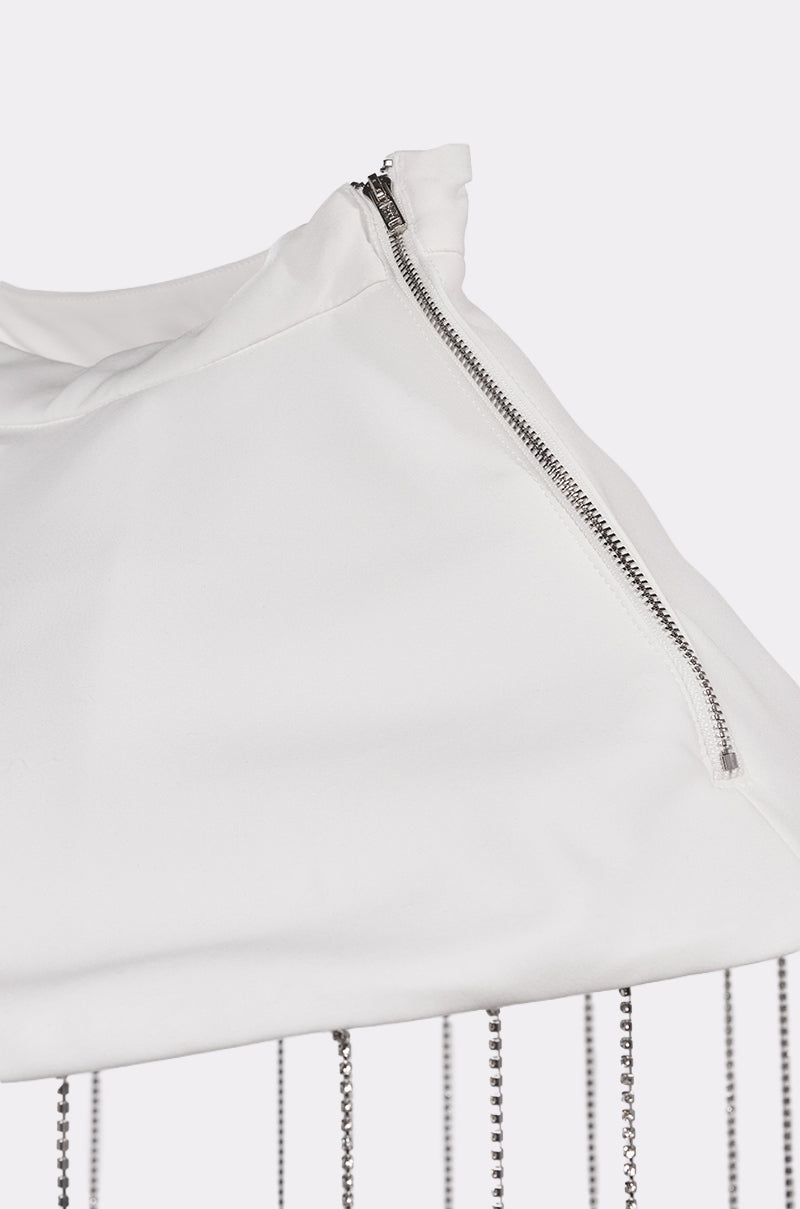A close-up of the REALLY LIKE THAT BELT features thin silver chain fringe hanging from a white fabric base with a silver zipper, set against a plain light background. 7