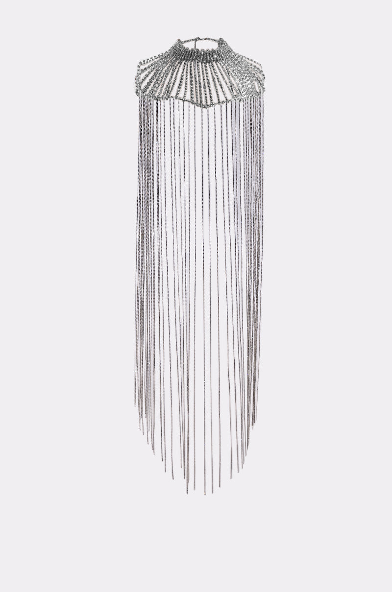 The TRU STATEMENT NECKLACE is a silver choker with multiple long, thin strands creating a dramatic fringe design, shown against a plain white background. 10