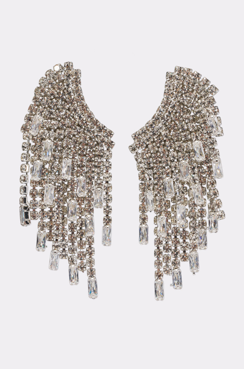 The SILVER DRIPPING CHANDELIER EARRINGS are wing-shaped silver drop earrings adorned with multiple rows of sparkling rhinestones and dangling rectangular crystals, creating a cascading, fringed design—perfect for adding dazzling rhinestone fringe to your evening wear.
