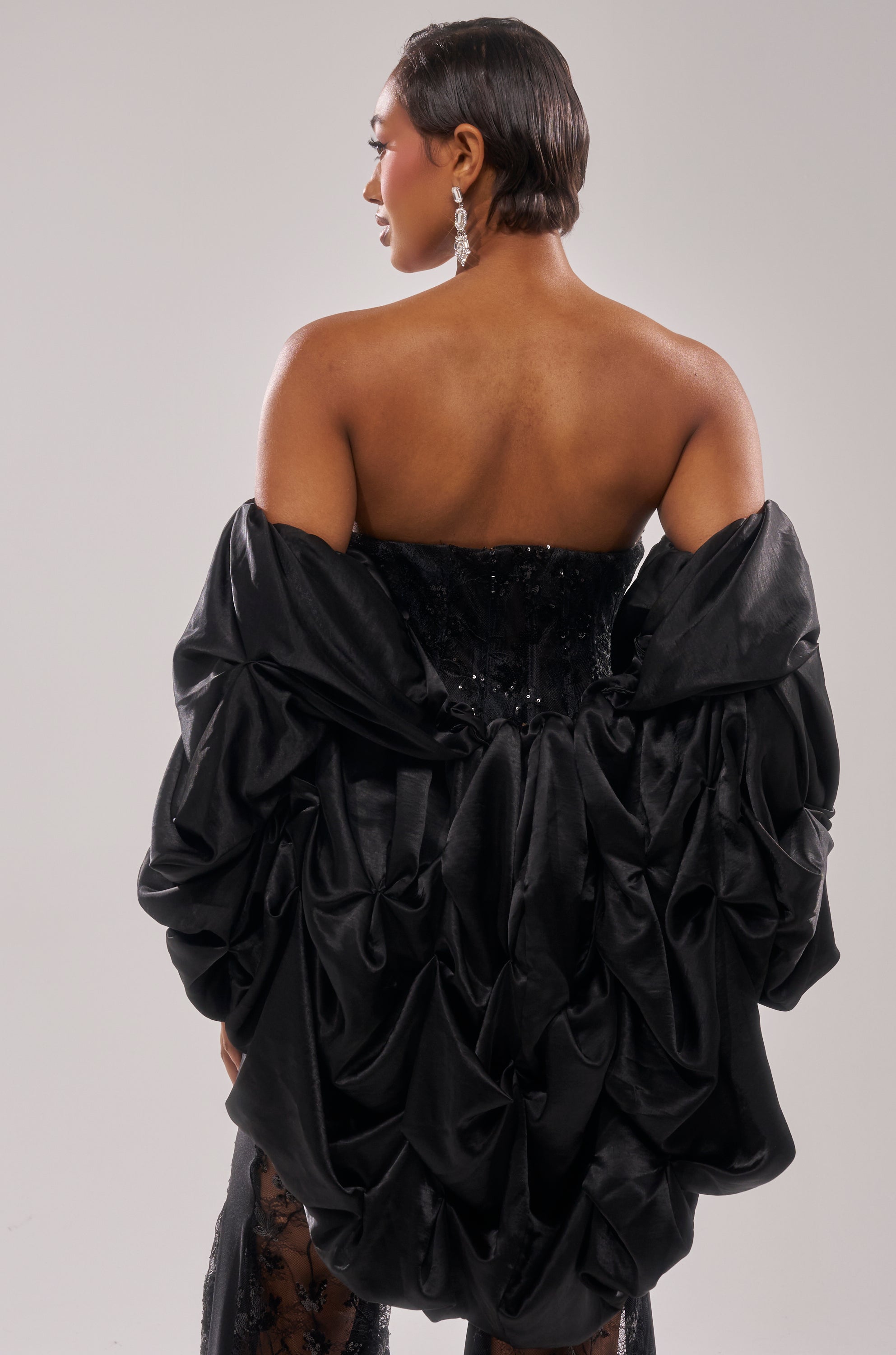 MORE THAN ENOUGH SATIN SHRUG IN BLACK – AKIRA
