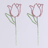 Two minimalist TULIP TIME EARRING designs feature pink rhinestones for petals and green ones for stems, symmetrically arranged on a light gray background, offering springtime chic.