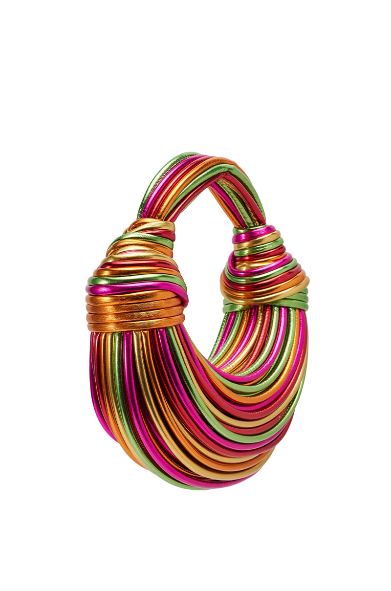 The COAST TO COAST ROPE PURSE features chunky, multi-layered metallic rope detailing in green, pink, orange, and gold—making it a bold and colorful statement accessory.