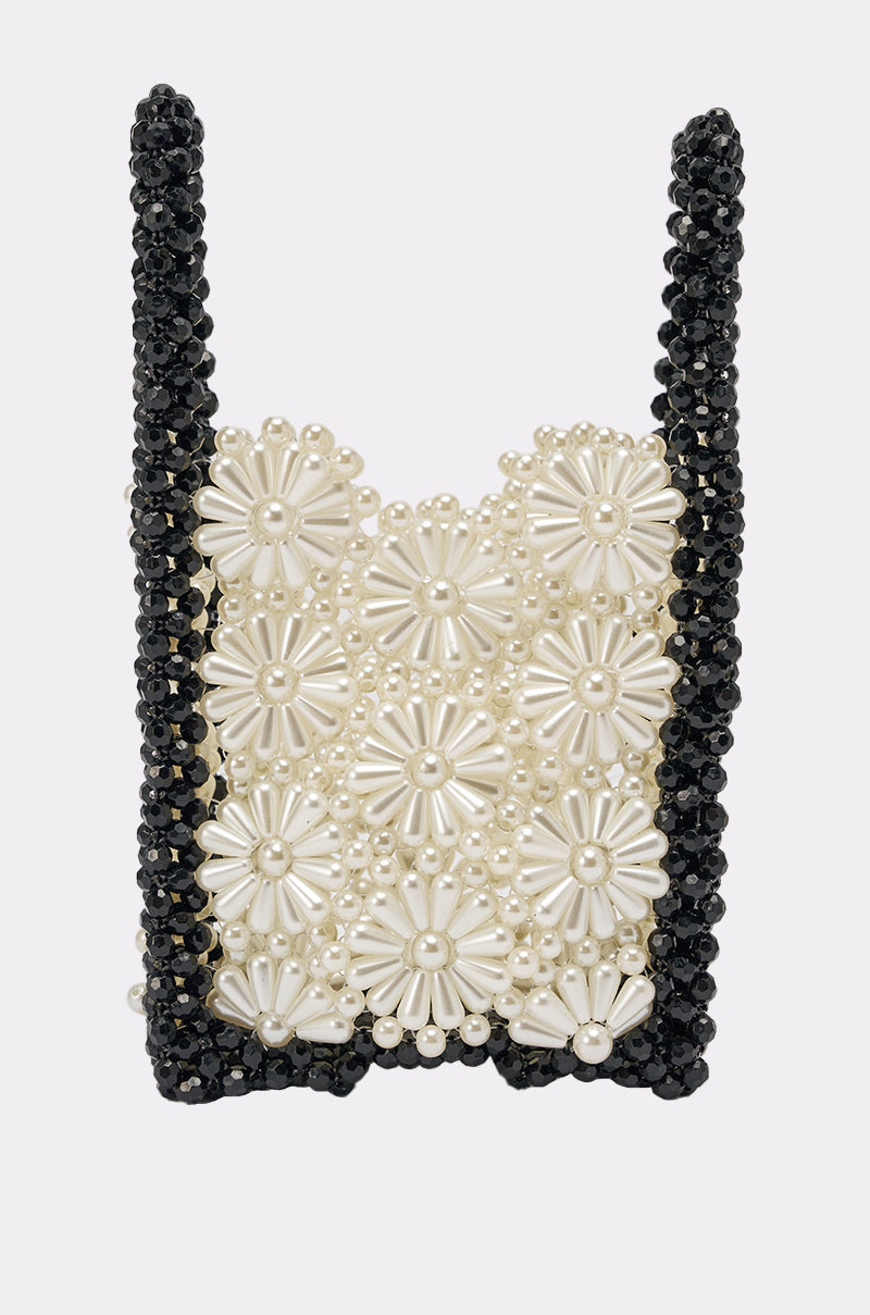 The ALL NIGHT LONG BEADED BAG features black beaded handles and edges, with a front panel decorated with white and pearl flower beads in a floral design—perfect for an elegant evening look. 1